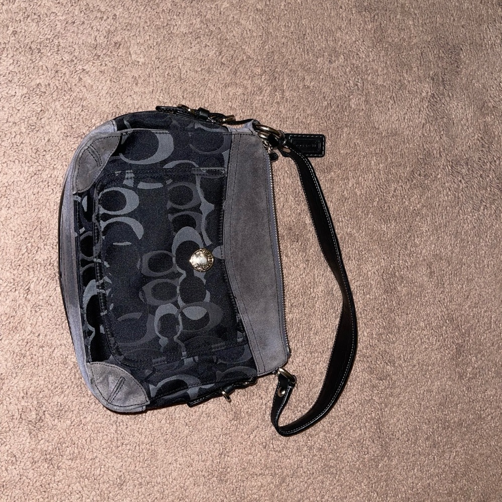 Black and gray Coach shoulder bag.